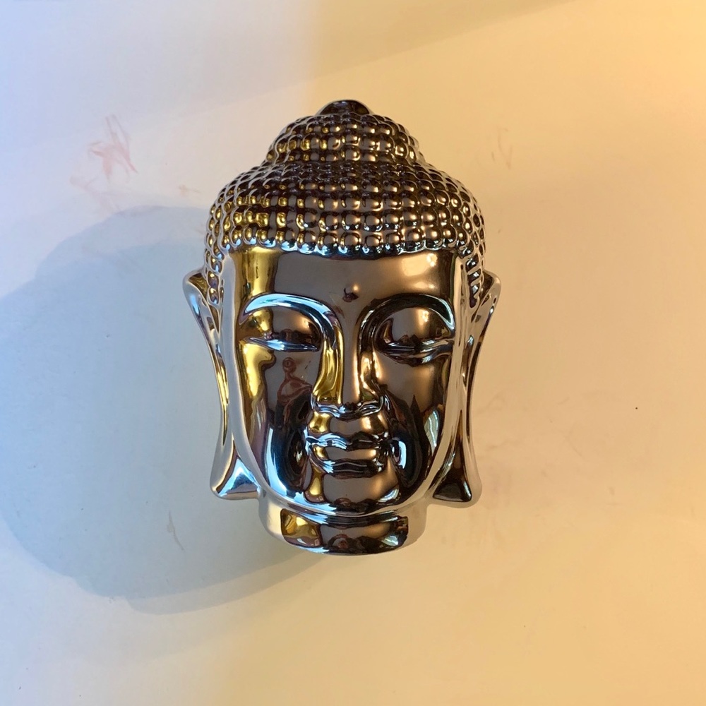 Chrome Buddha head table statue